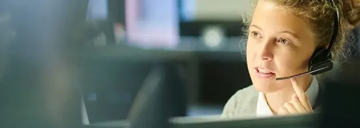 Woman talking with headset on