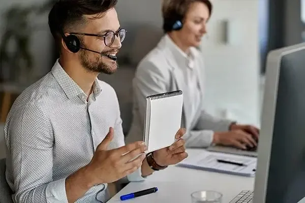 Man presenting over a VoIP video call