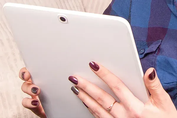 Woman looking at a tablet
