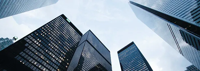 View of sky and glass office buildings