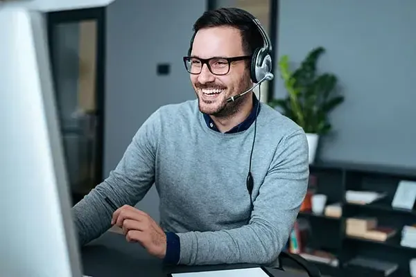 Man using VoIP call recording software on a phone call