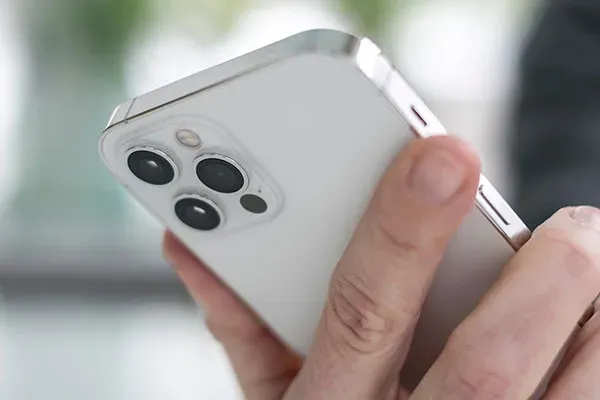 Person holding a business mobile phone