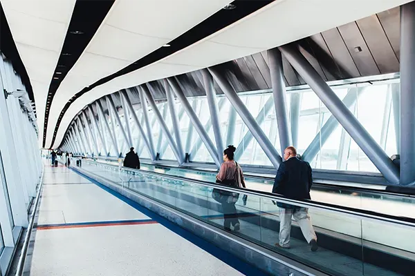 People on escalator at airport