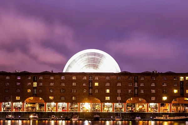 Building at night near water