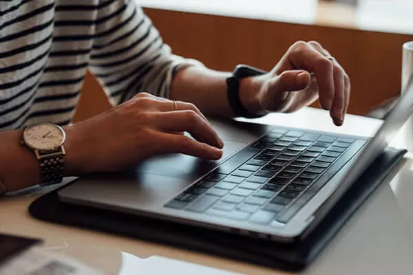 Person using an Apple Mac at work