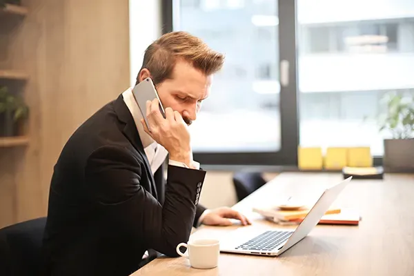 Man on mobile phone call