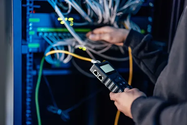 Man checking computer hardware