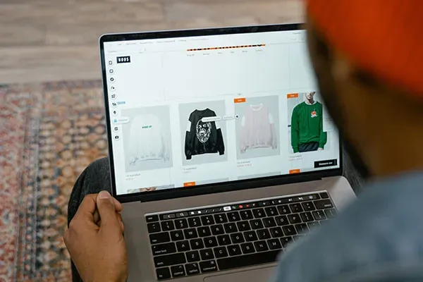 Man using laptop on lap