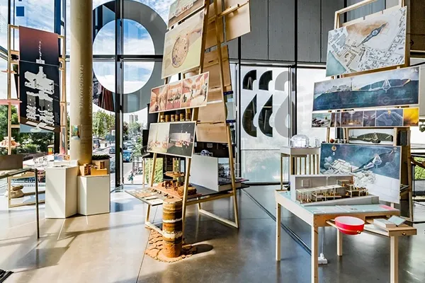 Paintings hanging in open room